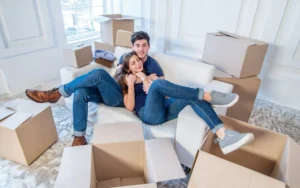 5 Tips of Managing Moving Stress - Happy Relaxed Couple Getting ready to Move