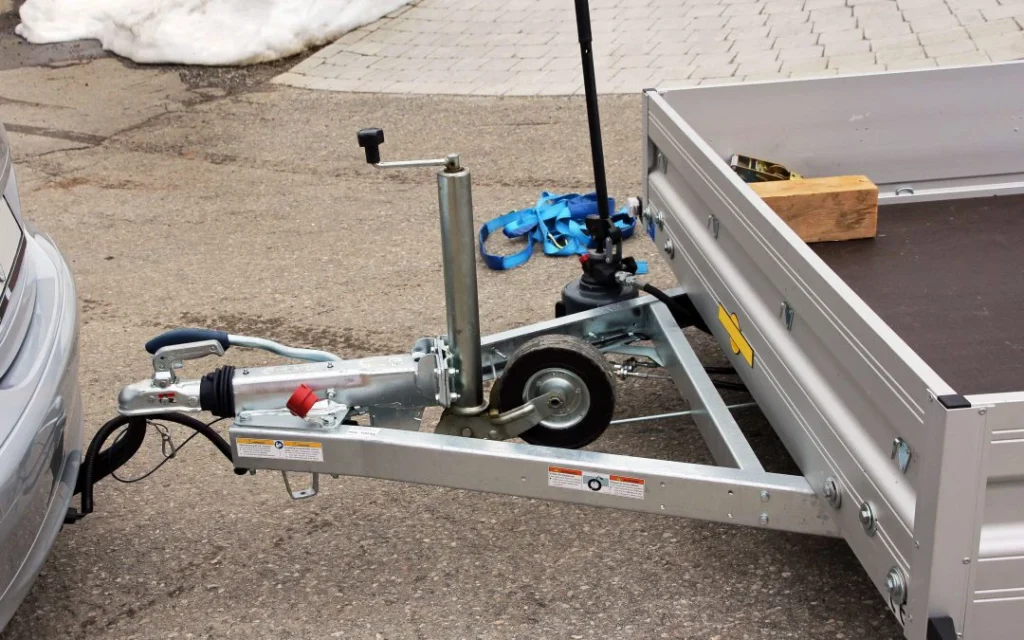 A Trailer Hooked up to a Vehicle for Moving