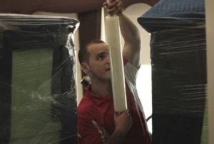 Attention to Detail Worker Wrapping Before a Move