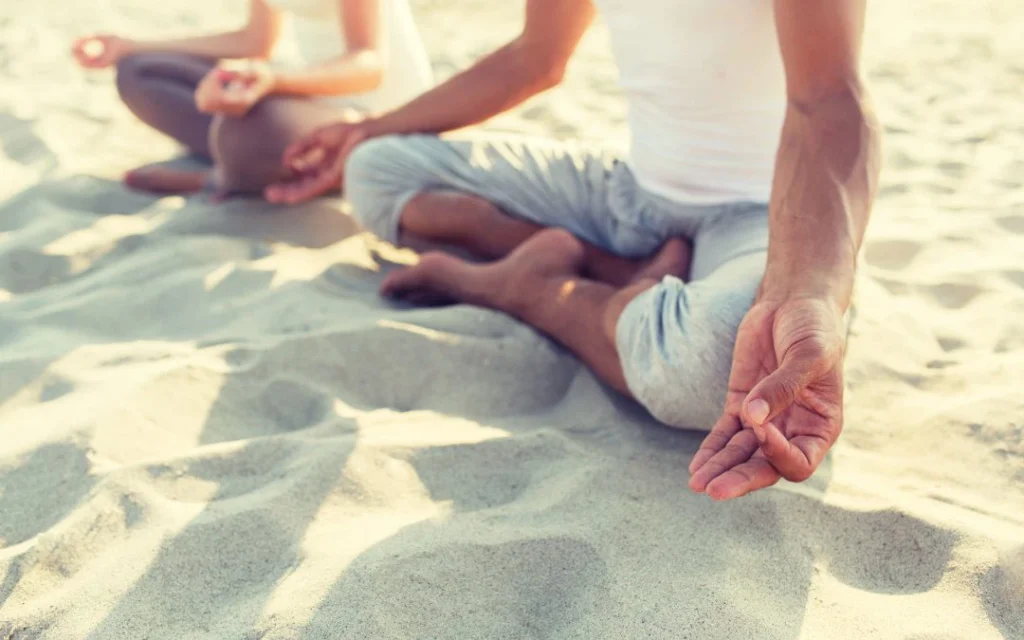 LA Locals on a Beach Meditating