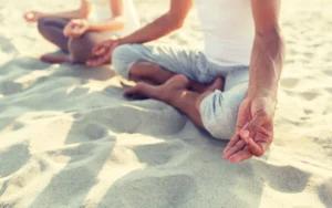LA Locals on a Beach Meditating